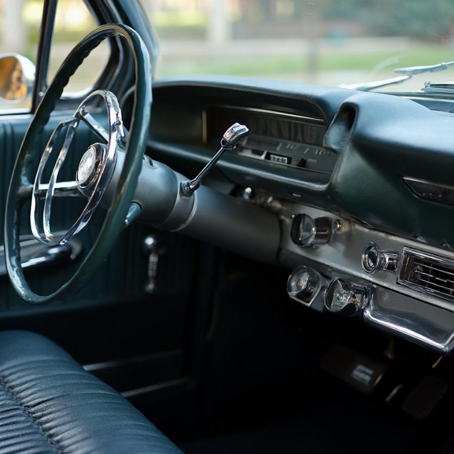 1961 Cadillac Coupe DeVille Interior Dashboard Showing Gauges and Steering Wheel