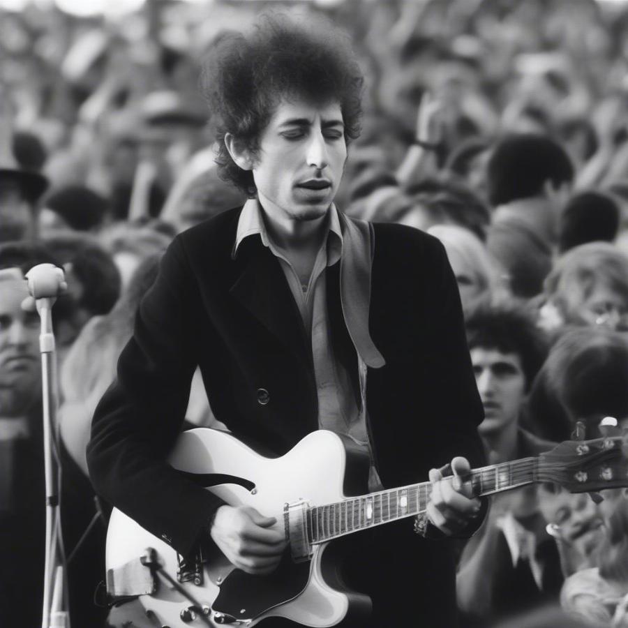 Bob Dylan performing at the Newport Folk Festival in 1965, marking his controversial shift to electric guitar.