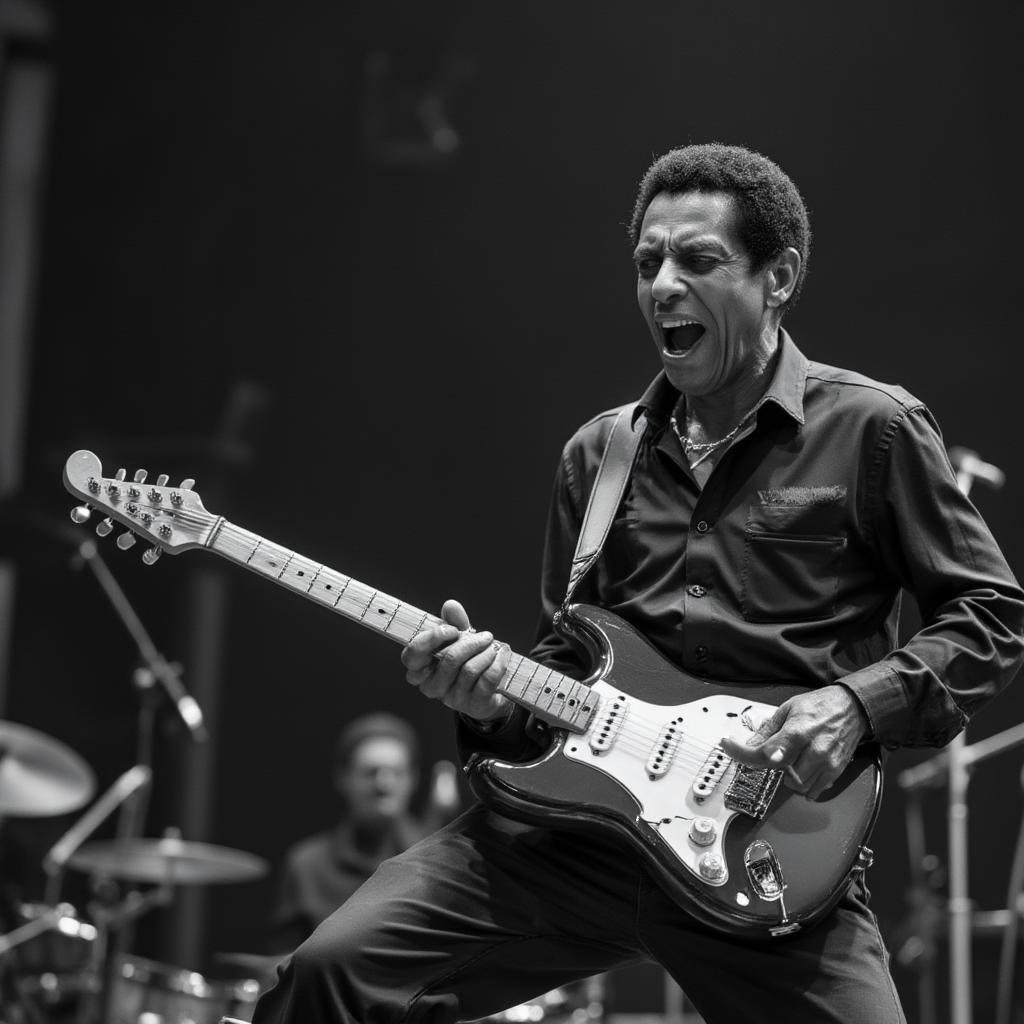 Chuck Berry performing his iconic guitar moves