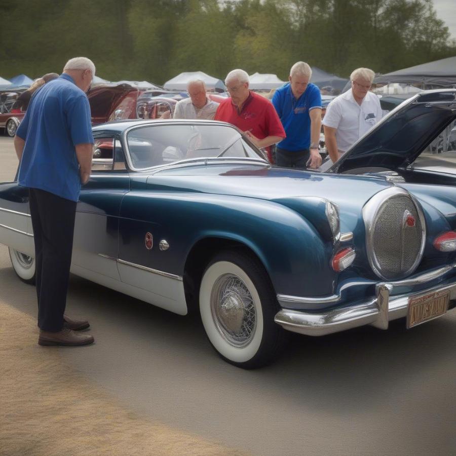 Judges Evaluating a Classic Car at a Show