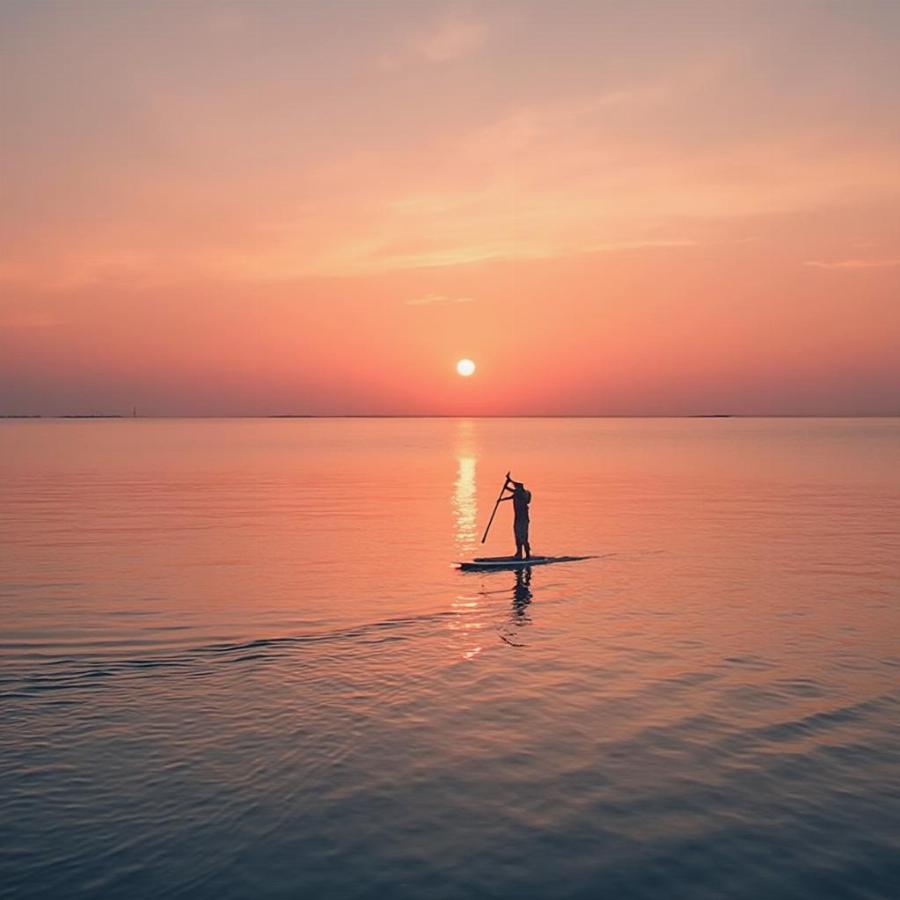 Paddleboarding at sunrise in Dublin Bay