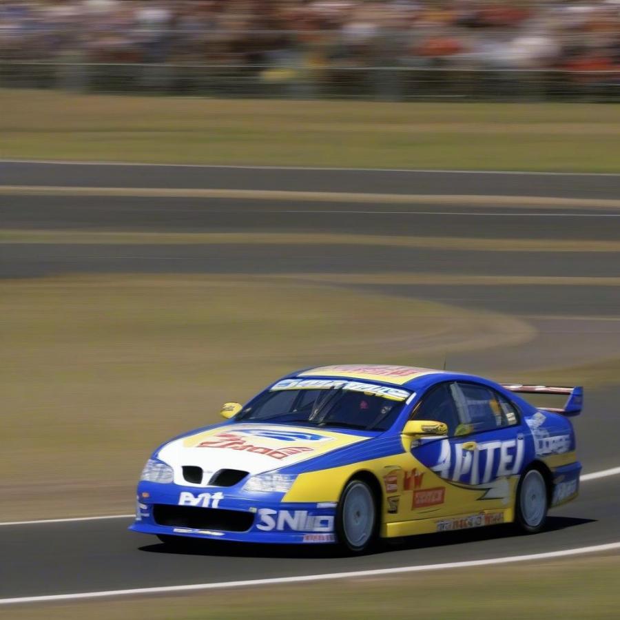 Marcos Ambrose driving the Pirtek Falcon in 2003