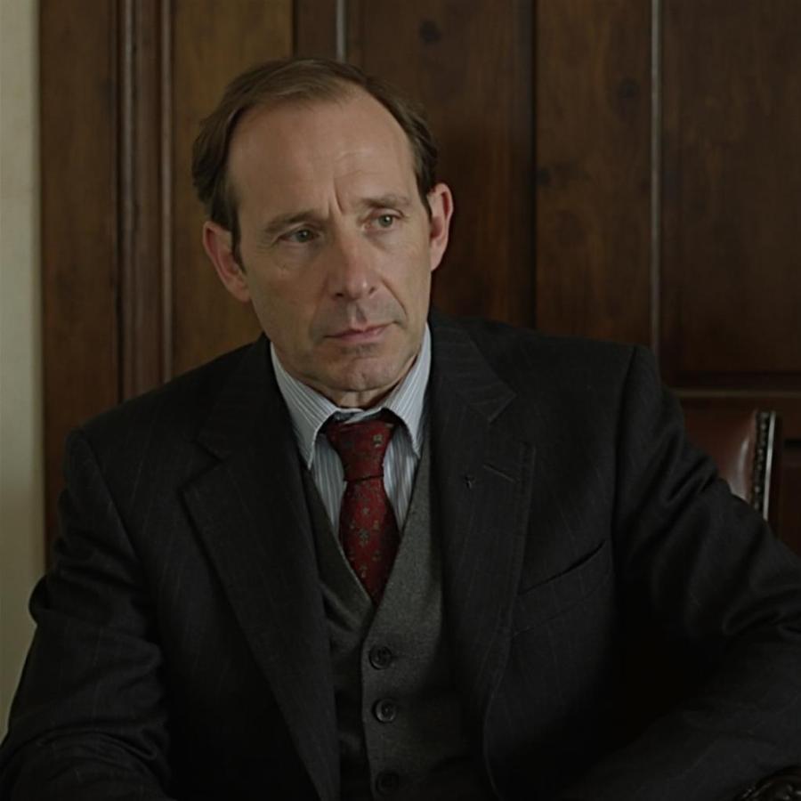 Ralph Fiennes as Harry Waters: A Darkly Comedic Hitman in In Bruges