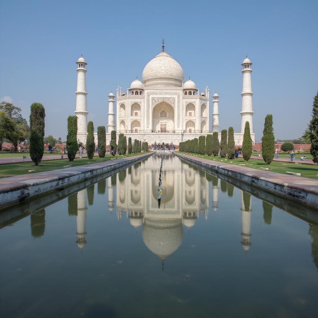 The Taj Mahal, a breathtaking white marble mausoleum, stands majestically on the banks of the Yamuna River in Agra, India.