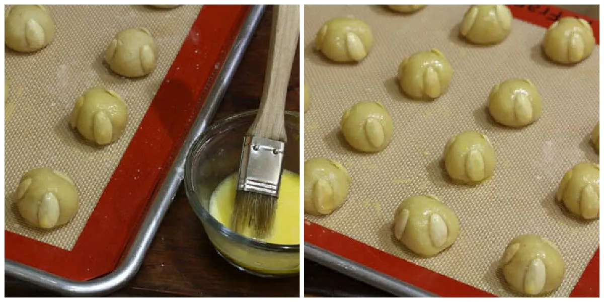 Bethmännchen vor dem Backen mit Eigelb bestreichen, um eine goldene Kruste zu erhalten