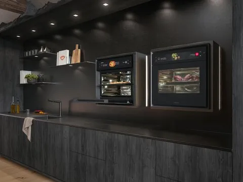 BORA X BO Dampfbackofen geöffnet mit frischen Speisen in einer Signature Kitchen 2025