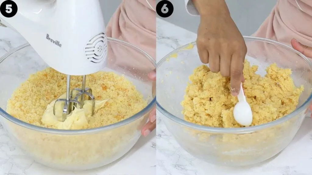 Cremige Buttercreme wird in einer Schüssel mit einem Handmixer zubereitet, ideal für Cakepop-Füllung
