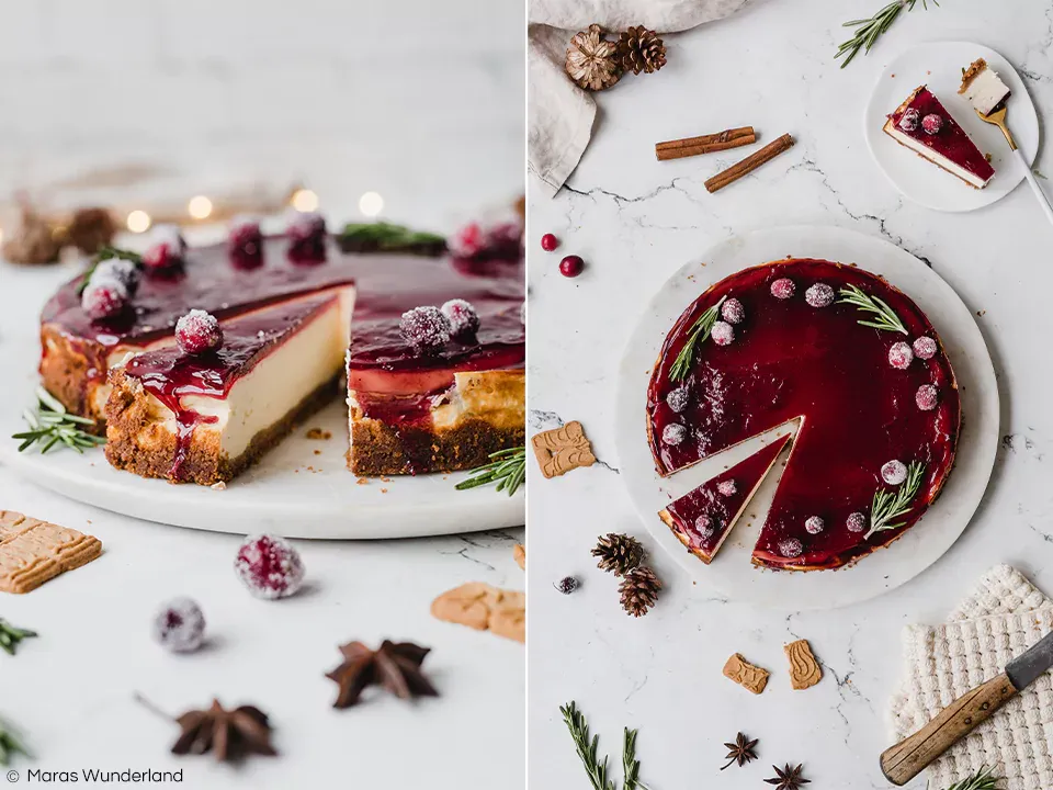 Ein Anschnitt des cremigen Glühwein-Käsekuchens mit seiner fruchtigen Schicht und dem knusprigen Spekulatiusboden auf einem festlichen Teller.