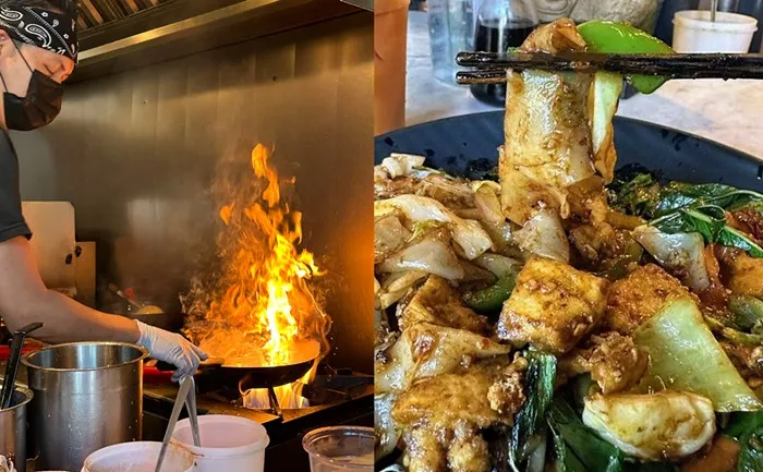 Ein Blick in eine lebhafte deutsche Restaurantküche bei der Zubereitung traditioneller Gerichte