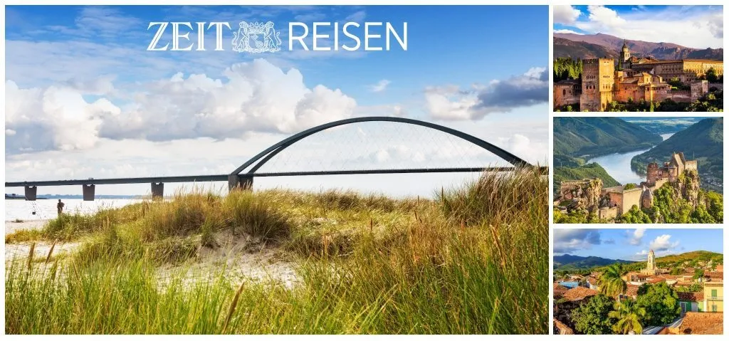 Ein roter und weißer Leuchtturm steht an einer Küste