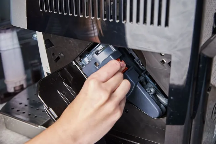 Entnahme der Brühgruppe