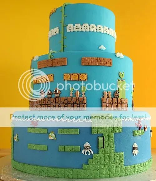 Fein geprägte und handbemalte Fondant-Elemente, die die detailreiche Ausführung des Super Mario Geburtstagskuchens unterstreichen.