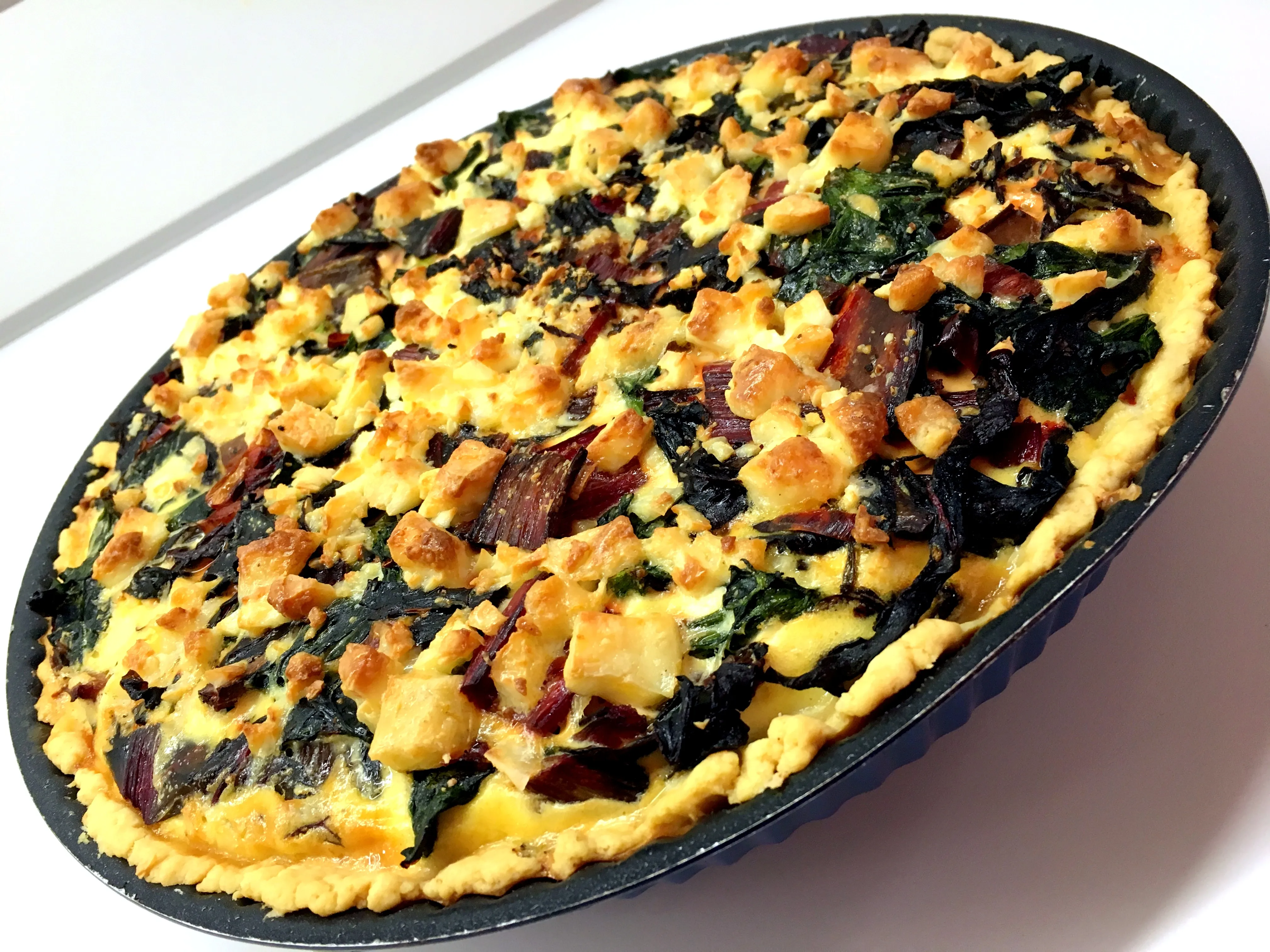 Gedünstete Mangold- und Spinatfüllung für die Quiche