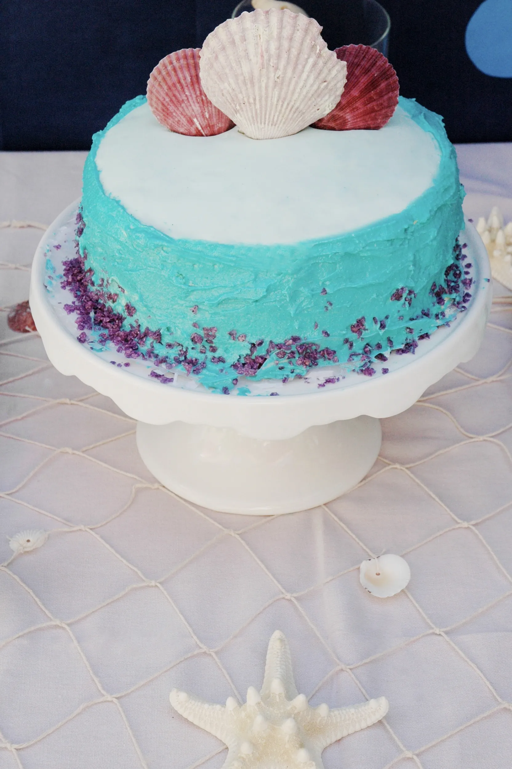 Kreative Dessert-Ideen für eine Meerjungfrauen-Geburtstagsparty, inklusive thematischer Cupcakes