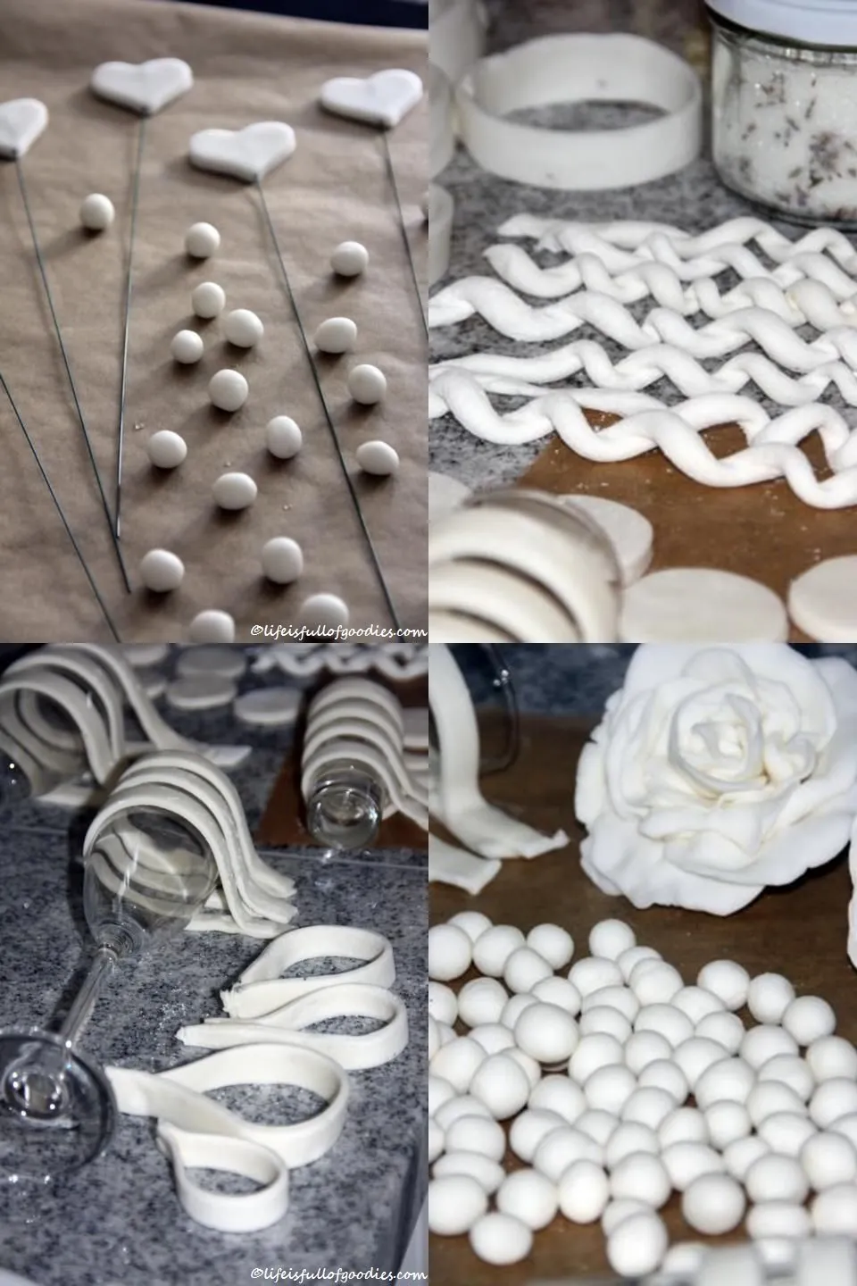 Nahaufnahme der handgemachten Fondant-Zuckerfiguren und der filigranen Schleife für die Geburtstagstorte.