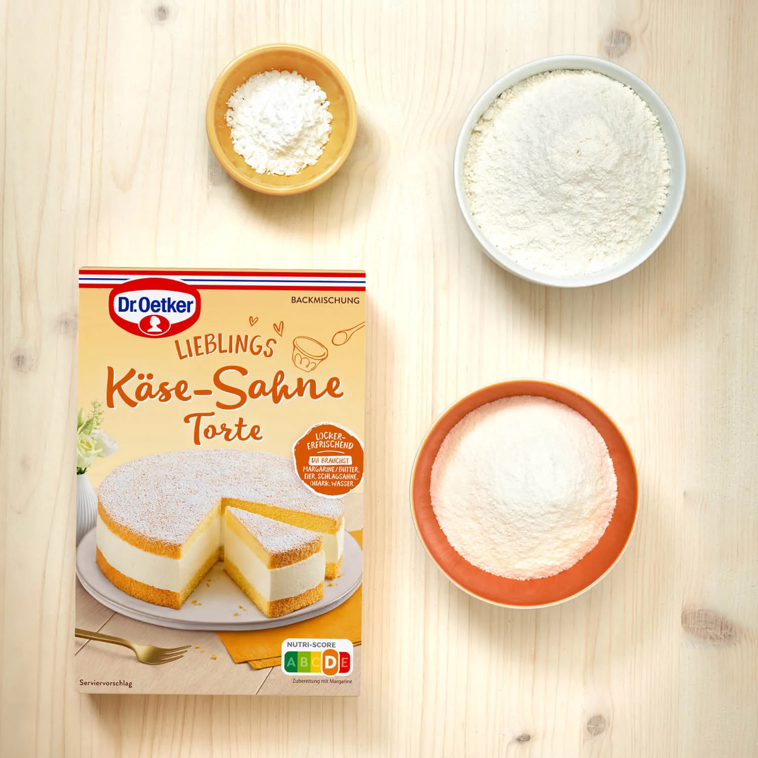 Nahaufnahme einer Käse-Sahne Torte Fertigmischung Packung mit leuchtendem Design.