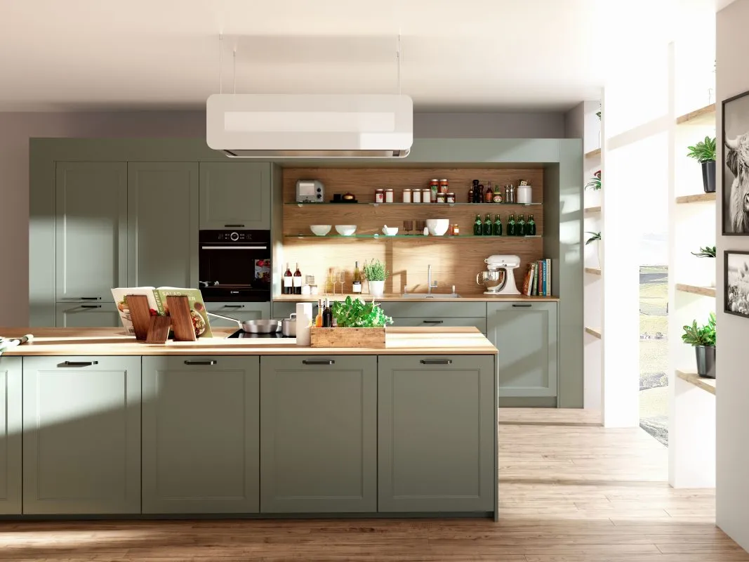 Neu interpretierte Landhausküche DANKÜCHEN Classico in Fjordgrün mit Nordic Eiche Arbeitsplatte, modern und traditionell.