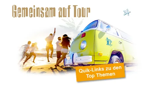 Reisende vor einem Bus, der zum Abenteuer einlädt, mit Reisepartnern in spe