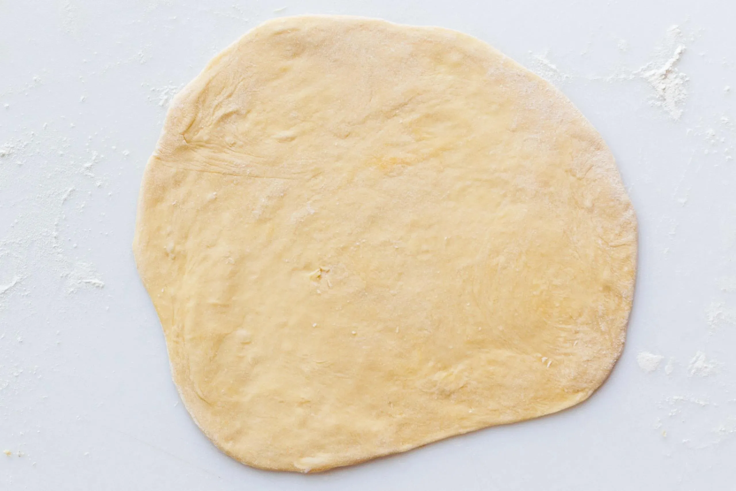 rolled out pelmeni dough