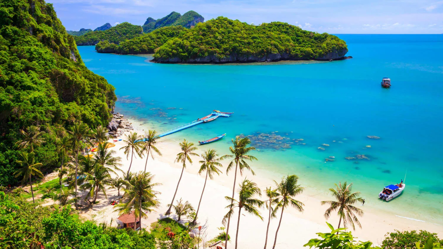 Strand von Ko Samui, Thailand, mit Palmen und türkisblauem Meer