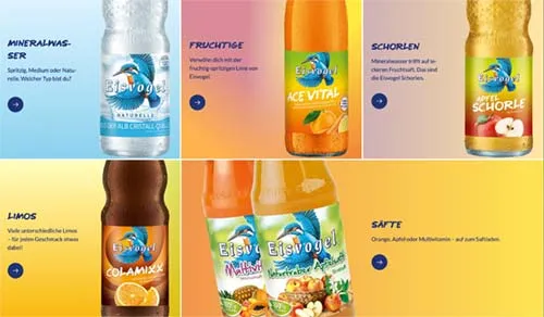 Verschiedene Flaschen von Eisvogel Getränken, darunter Säfte, Limonaden und Mineralwasser, präsentiert in einem Getränkemarktregal.