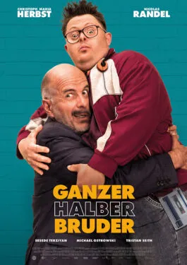 Zwei Männer, die eine unerwartete Bindung teilen, ähnlich den überraschenden Kombinationen in der regionalen Ruhrpott-Küche.