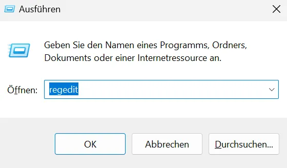 Das Ausführen-Dialogfeld mit dem eingegebenen Befehl &quot;regedit&quot; zum Starten des Registrierungseditors