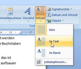 Ein Beispiel für ein Initial, wie es in Microsoft Word dargestellt wird, mit den umfließenden Zeilen.