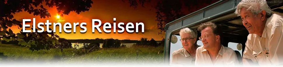 Frank Elstner auf einer seiner Reisen, im Gespräch mit einem Tierpfleger