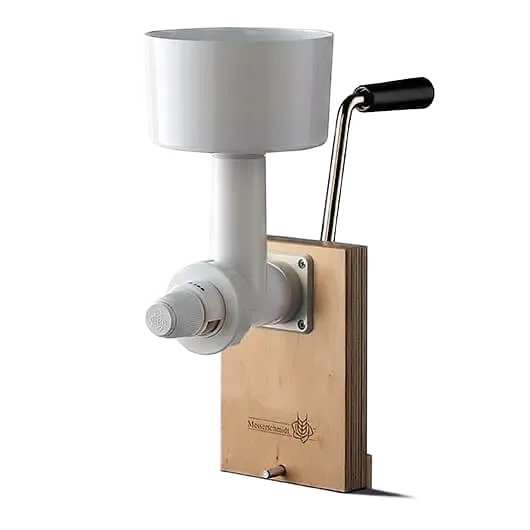 Vielseitige Nutzung der Getreidemühle mit Handantrieb, demonstriert die Robustheit des Systems