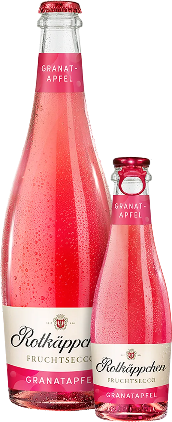 Zwei Flaschen Rotkäppchen Fruchtsecco Granatapfel vor einem sommerlichen Hintergrund