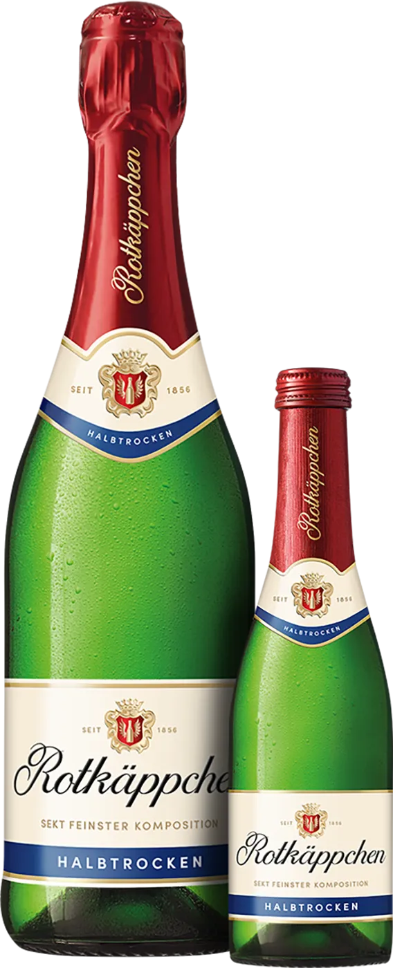 Zwei Flaschen Rotkäppchen Sekt Halbtrocken auf einer festlich gedeckten Tafel