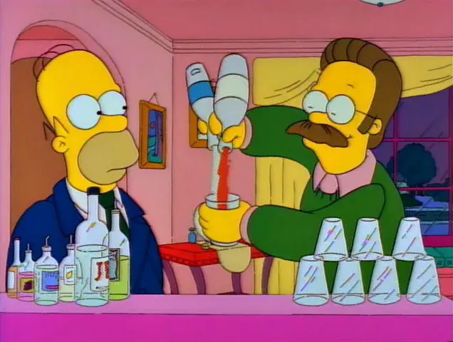 Eine Sandwichplatte, die in grünen Buchstaben die Worte „ENJOY OUR PARTY SNACKS“ bildet