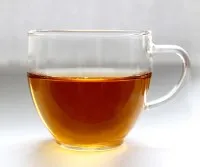 Kräutertee als Hausmittel gegen Magenschmerzen und Magenbeschwerden