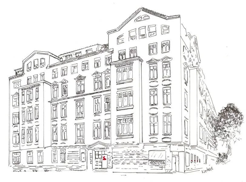 Eine Gruppe von Kindern und Erwachsenen lächelt in die Kamera in einem freundlichen Raum