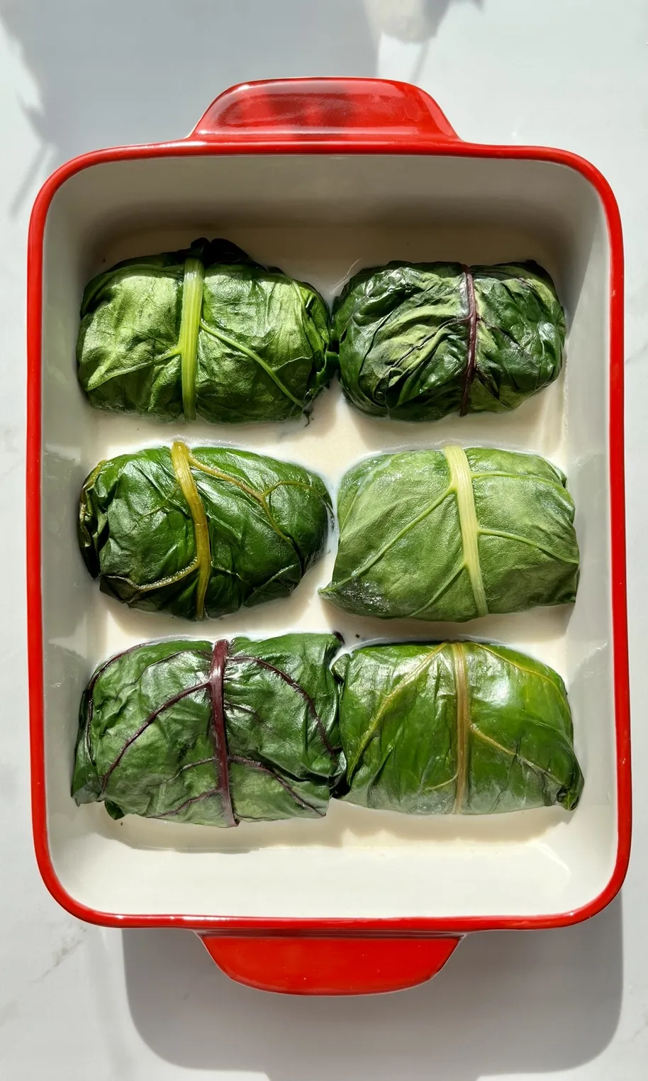 Frisch zubereitete Capuns auf einem Teller, bereit zum Genuss